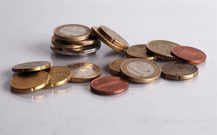 Euro-mynt, berg av mynt, 1 euro-mynt, 2 euro mynt, finansiering begrepp, pengar