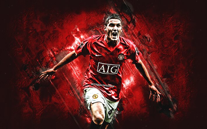 Federico Macheda del Manchester United, giocatore di calcio italiano, ritratto, rosso pietra sfondo, calcio