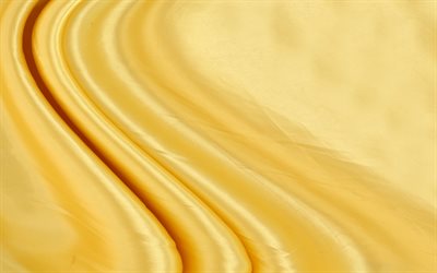 golden texture di seta, di seta, le onde, la texture di seta d&#39;oro sfondo, giallo texture tessuto, seta gialla