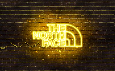 The North Face yellow logo, 4k, yellow brickwall, The North Face logo, brands, The North Face neon logo, The North Face