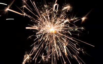 oro botti, fuochi d&#39;artificio, stelle filanti su uno sfondo nero, Sparkler, sfocatura