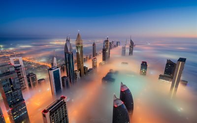 Dubai, skyscrapers in fog, night, UAE, tops of skyscrapers, modern buildings, towers