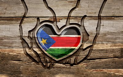 amo il sud sudan, 4k, mani intagliate in legno, giorno del sud sudan, bandiera del sud sudan, prenditi cura del sud sudan, creativo, bandiera del sud sudan in mano, intaglio del legno, paesi africani, sud sudan
