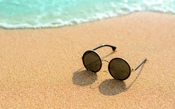 glasses on the sand, beach, sea, summer travel concepts, sand