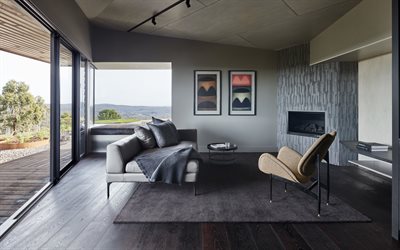 design interior elegante, sala de estar, interior cinza, estilo loft, lareira estilo loft, piso de madeira marrom escuro, design interior moderno da sala de estar