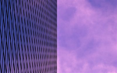 glass building facade, evening, sunset, purple sky, modern buildings