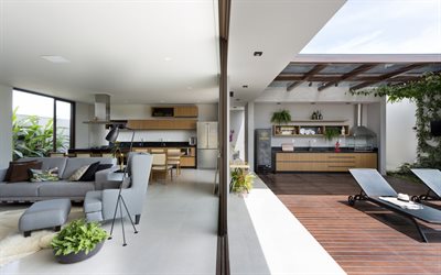 eleganti interni di una casa di campagna, soggiorno, terrazza, cucina, arredamento design, illuminazione interni, lo stile del minimalismo