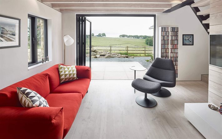 スタイリッシュなアパートのデザイン, living room, 赤いソファ, 明るいフローリング, スタイリッシュな本棚, モダンなインテリアデザイン