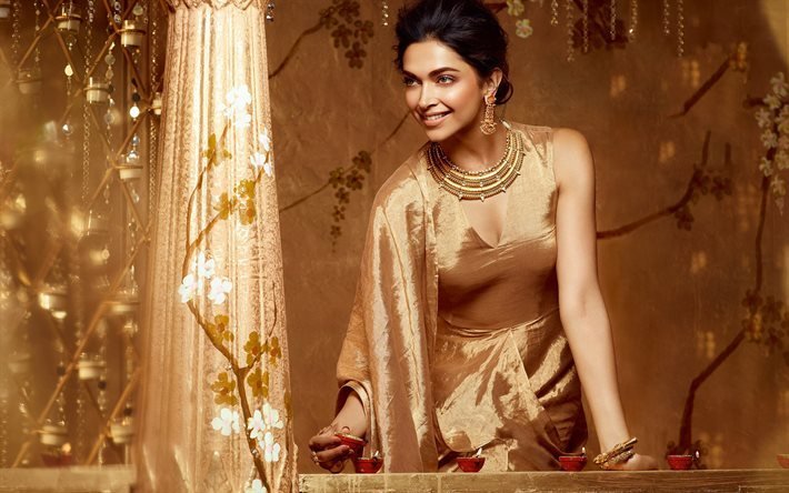 Deepika Padukone, actrice indienne, séance photo, robe dorée, robe indienne traditionnelle, star indienne, Bollywood, attributs populaires