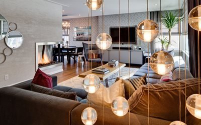 elegant vardagsrum inredning, vackra runda lampor, modern interior design, vardagsrum, &#246;ppen spis