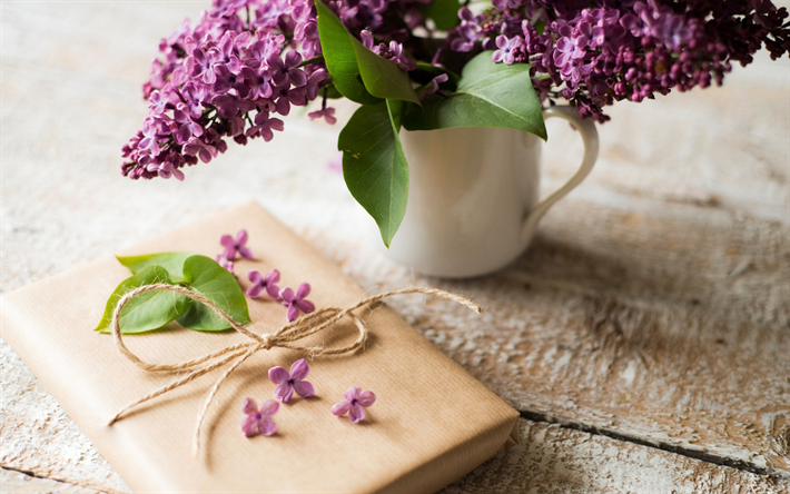 Lilac, mood concepts, bouquet of lilacs, book on the table, spring, purple spring flowers