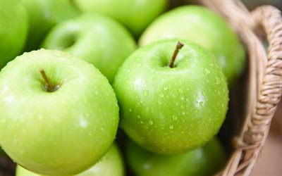 green apples, fruits, basket with apples, background with apples