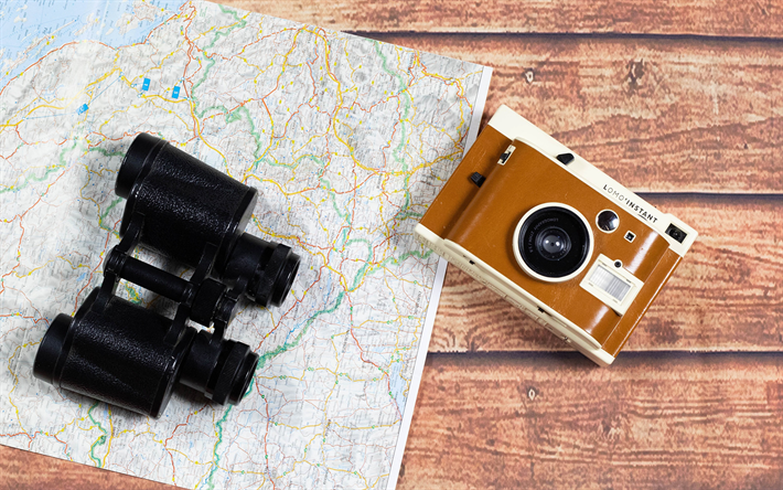 binoculars on the map, travel concepts, map, camera, things for travel