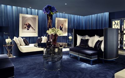 lujoso interior azul, dise&#241;o elegante, azul sof&#225;, una mesa de vidrio, interior de estilo