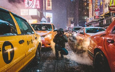 L&#39;am&#233;rique, l&#39;hiver, &#224; New York, la nuit, le taxi, le photographe, &#233;tats-unis