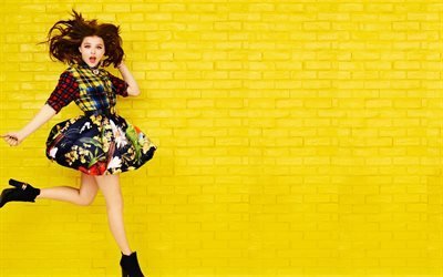 Selena Gomez, singer, jump, yellow wall, beauty, brunette