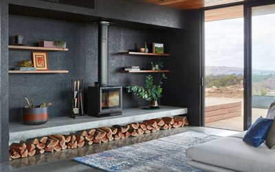 cheminée élégante dans le salon, mur noir, style loft, cheminée, idée de cheminée, design intérieur moderne, salon