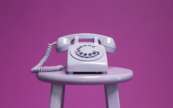 old phone, telephone, dial telephone, purple background, call center concepts, support concepts