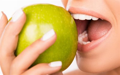 denti sani, donna morde una mela verde, odontoiatria, concetti, denti bianchi, denti belli