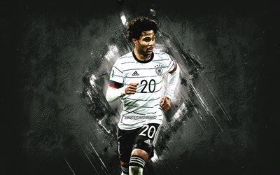 Serge Gnabry, squadra nazionale di calcio tedesca, calciatore tedesco, centrocampista, sfondo di pietra grigia, Germania, calcio