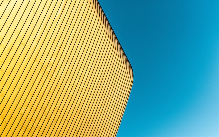 gelb-blauer hintergrund, goldene fassade des geb&#228;udes, moderne architektur, moderne bauten, stilvolle hintergrund