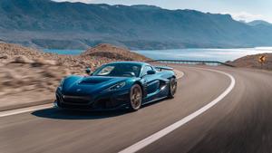 4K Blue Car Driving On Road Wallpaper
