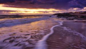 A beach backdrop of a picturesque sea and sand. beach wallpaper