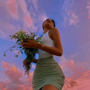 A beautiful aesthetic girl looking out into the sunset aesthetic girl wallpaper