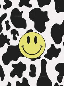 a black and white cow print with a smiley face preppy smiley face wallpaper