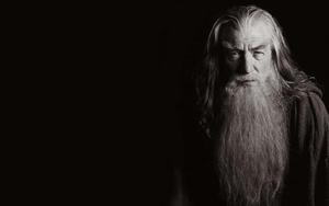 a black and white photo of a man with long hair lord of the rings wallpaper