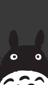 A black Totoro, standing among plants totoro wallpaper