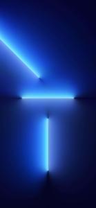 a blue light is shining on a dark background iphone 13 pro wallpaper
