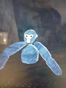 a blue stuffed animal is sitting on a table gorilla tag wallpaper