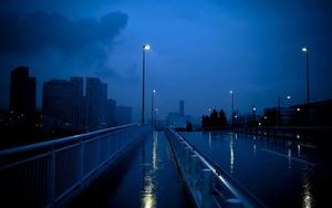 a bridge with a city in the background aesthetic computer 4k wallpaper