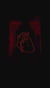 A broken heart symbol against a black background broken heart black wallpaper