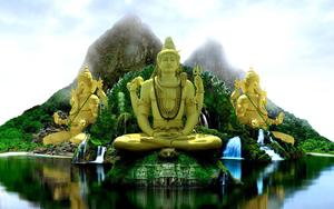 A Buddha statue in a lotus flower, illuminated by the moonlight buddha wallpaper