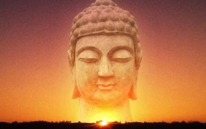 a buddha statue is shown at sunset buddha wallpaper