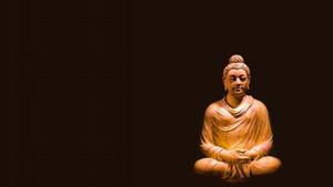 a buddha statue is sitting on a black background buddha wallpaper
