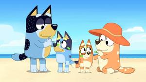 a cartoon dog and his family on the beach bluey wallpaper
