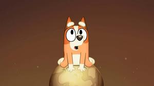 a cartoon dog is sitting on top of an egg bluey wallpaper