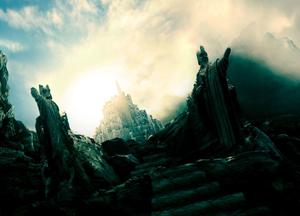 a castle with a lot of rocks and trees lord of the rings wallpaper