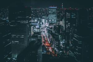 a city at night with lights and buildings aesthetic computer 4k wallpaper