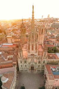 a city with a cathedral in the background barcelona wallpaper