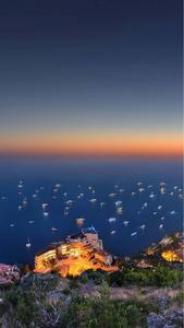 a city with boats in the water calming iphone wallpaper