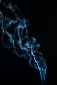A close up of a bright blue Android smoky vapor android wallpaper
