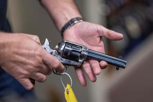 A close-up of a handgun gun wallpaper