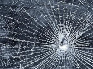 A cracked smartphone screen covered in colorful chalk adds an artistic element to a common tech problem cracked screen wallpaper