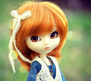 a doll with orange hair and a blue dress whatsapp dp wallpaper