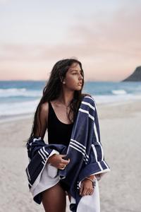 A Girl on the Beach Enjoying the Sun girl wallpaper