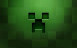 A Green Creeper Face in Minecraft Wallpaper